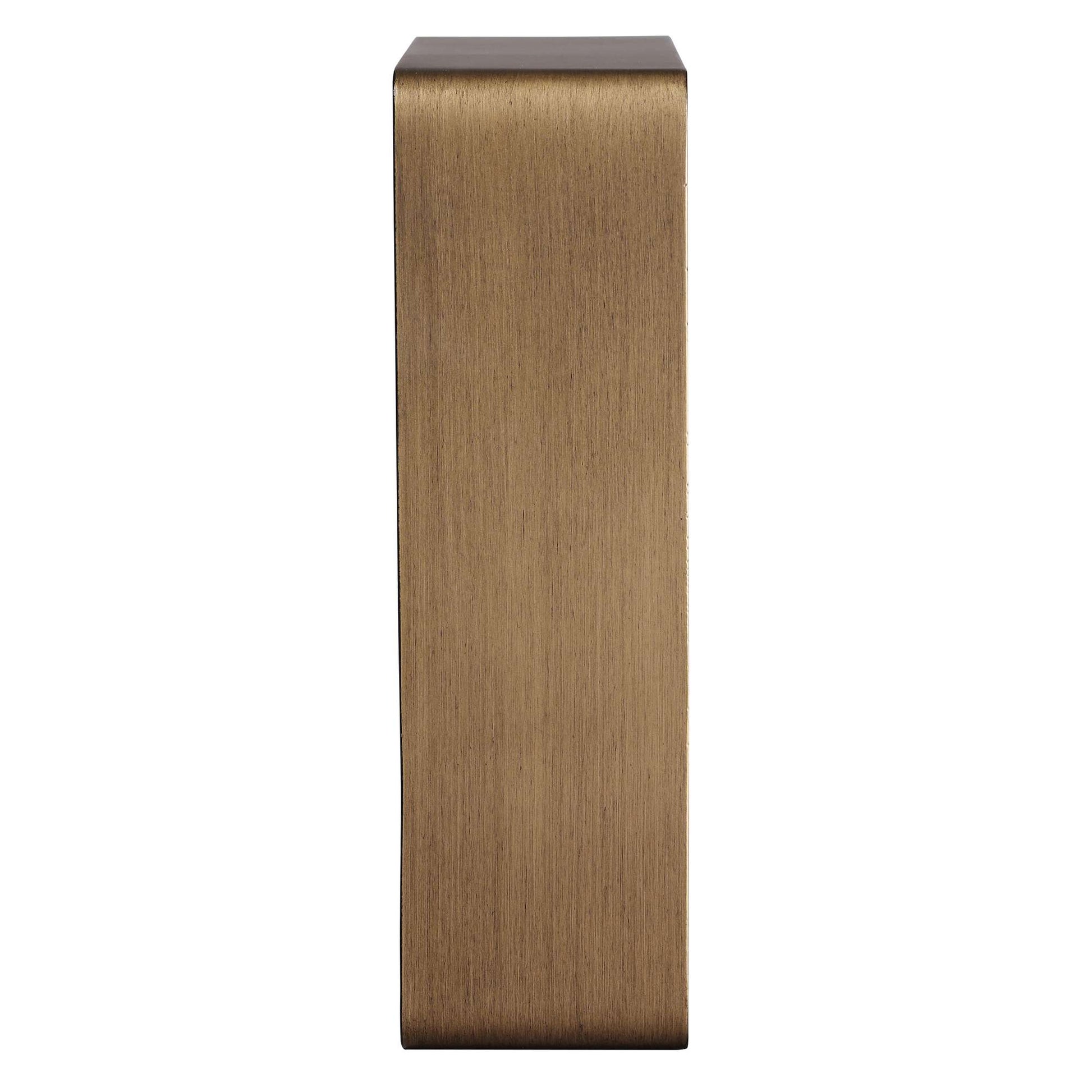 A tall bronze-colored rectangular object with a smooth surface.