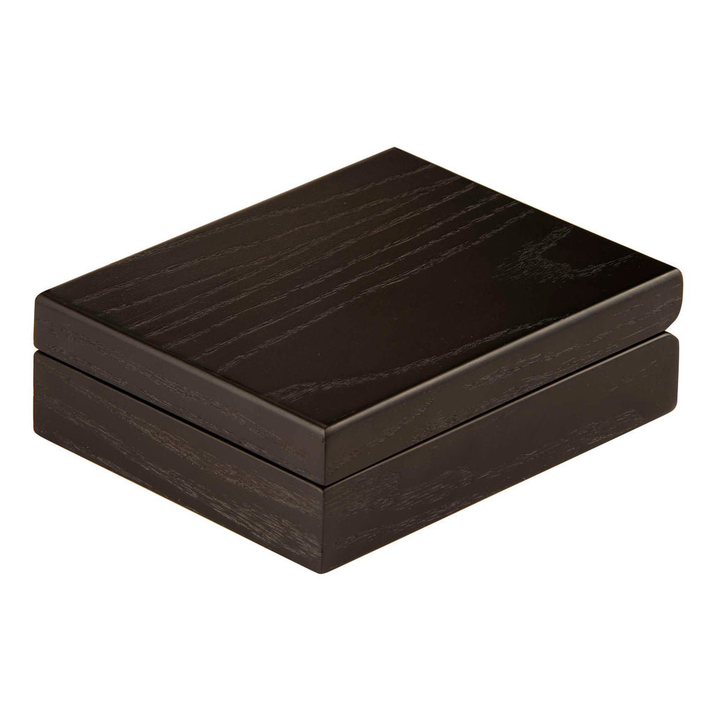 A closed rectangular wooden box with a dark finish.