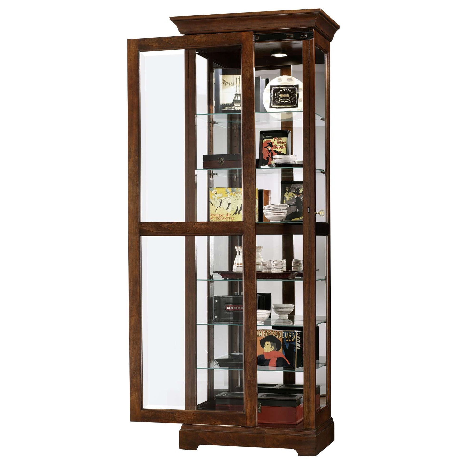 A wooden display cabinet with glass doors showcasing various collectibles and decorative items.