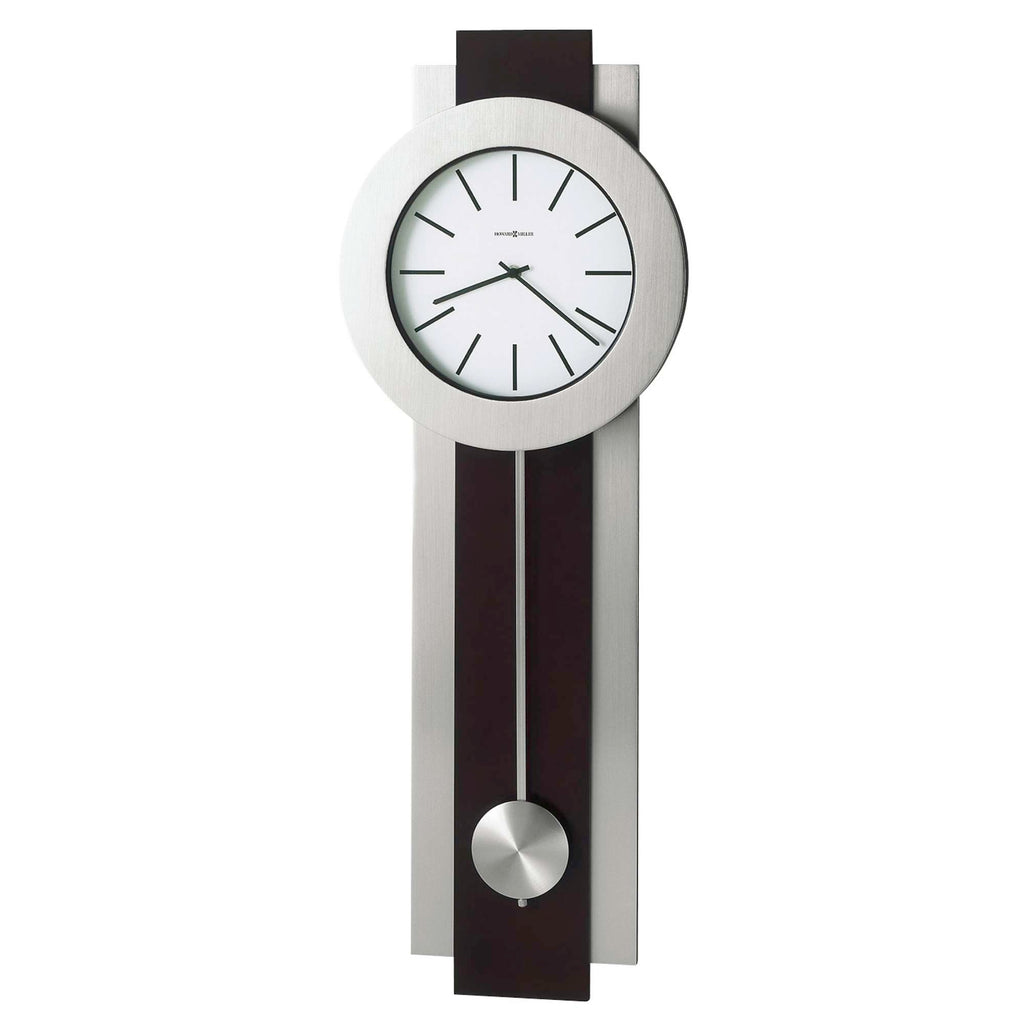 Modern wall clock with a round face and a sleek design.