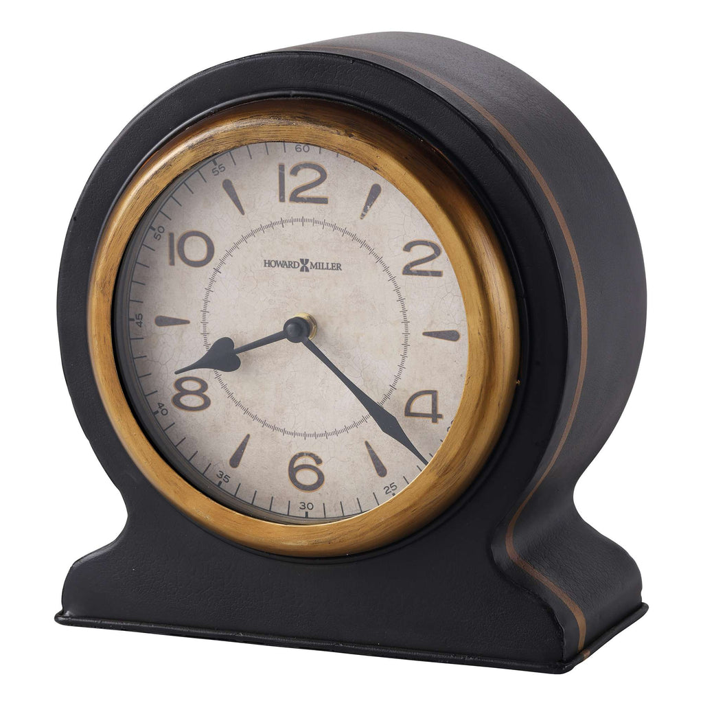 Vintage round clock with a gold-tone bezel and black base