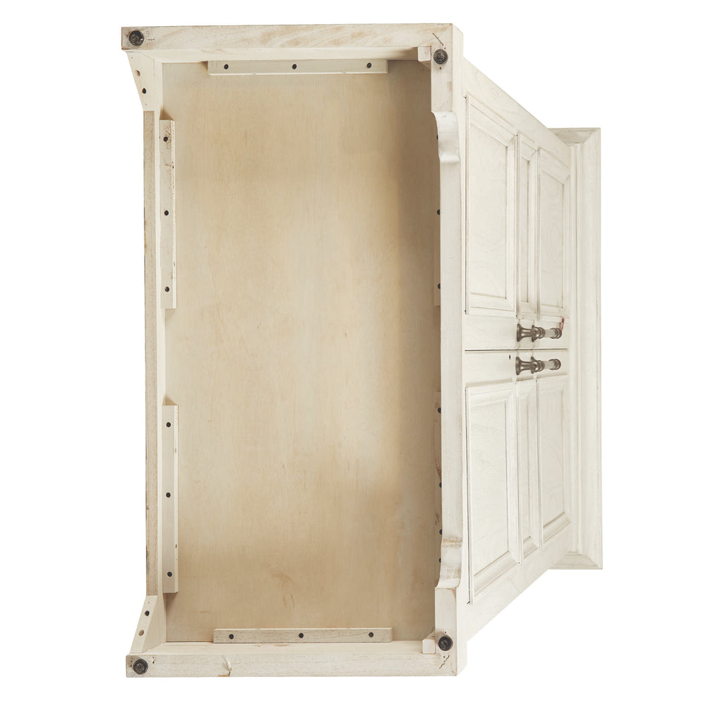 Top view of an empty, light-colored cabinet with decorative doors