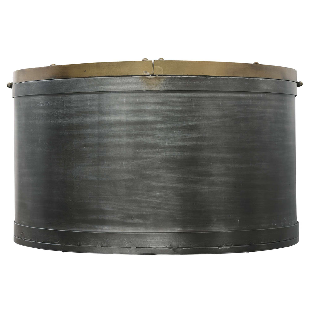 A cylindrical metal container with a bronze rim.