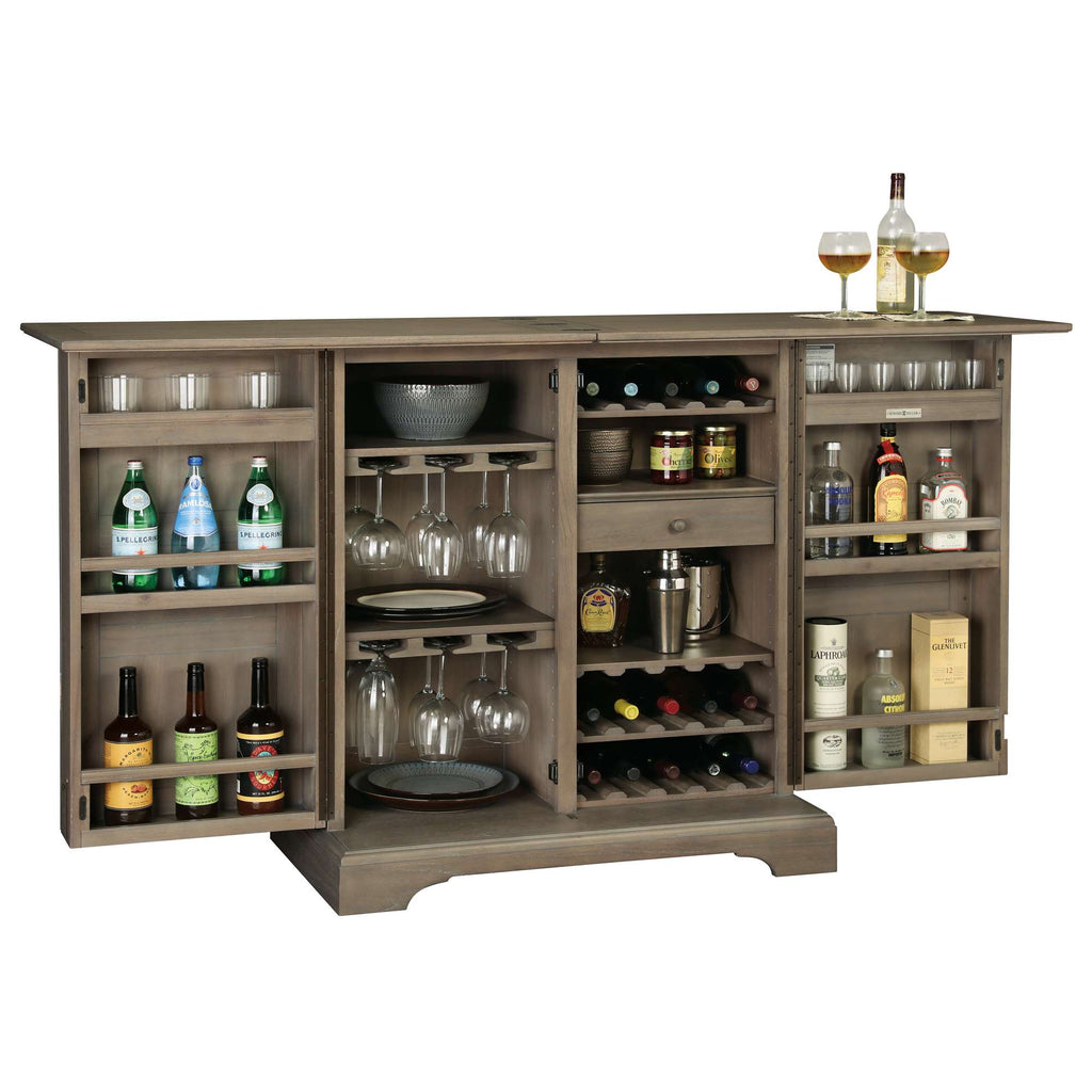 A modern bar cabinet featuring various bottles of alcohol, glassware, and storage compartments.